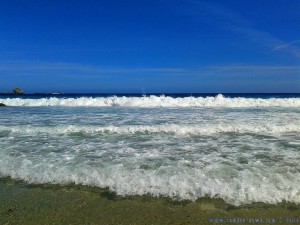 Kräftige Wellen auch bei Ebbe am Praia de Santa Comba – Spain