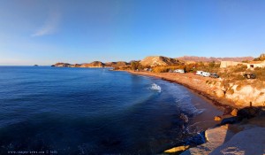 Playa de las Palmeras and view to the Castillo de San Juan de los Terreros with the Isla Negra – Spain
